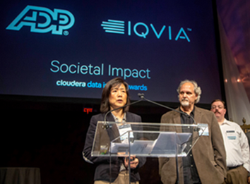 Data Scientists, Xiaojing Wang and Jim Haas of ADP accept the Cloudera 