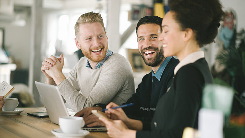 Business colleagues working together in a cafe Business colleagues working together in a cafe