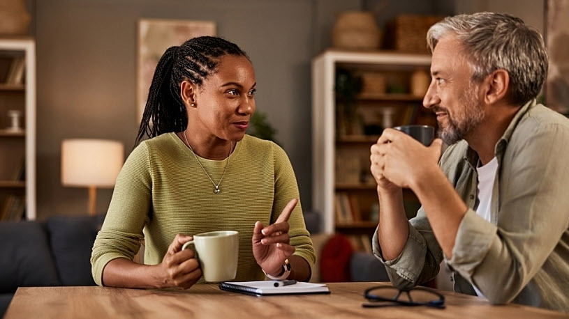 two small business owners having a conversation over coffee two small business owners having a conversation over coffee