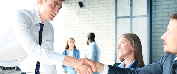 Knowing How to Interview Is a Vital Skill for SBOs Businesspeople talking and shaking hands