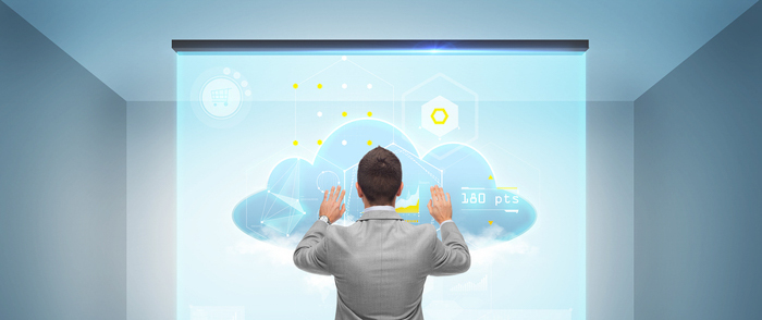 Making the Most of Your Cloud Technology Investment A businessman works with a cloud on a virtual screen.