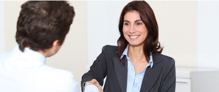 The Onboarding Experience: How to Keep Your New Employee Engaged Employer welcoming new employee to the job