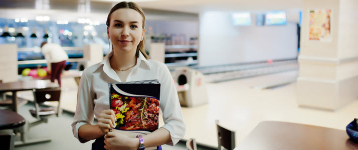 Womens pandemic job growth gap persists but with positive signs Waiter woman holding menu at restaurant